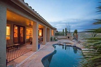 Home for sale in Saddlebrooke with sweeping Catalina Mountain Views and pool.